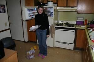 Jenny cleans the freezer